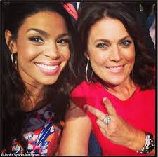 BET Awards 2013: Jordin Sparks shows off some major curve appeal in a  skin-tight orange floral dress at the BET Awards