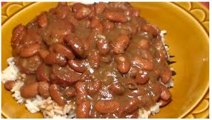 A classic new orleans recipe for red beans and rice made with red beans, spicy sausage, onions, garlic and green bell peppers. Red Beans And Rice Rice Recipes