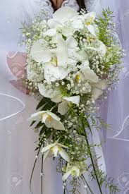 Fragrant and exotic, orchids come in a variety of shapes and colors, making them a versatile option for your bouquet. White Orchid Bridal Bouquet Off 72 Buy