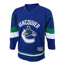 The canucks used versions of the johnny canuck logo for their team jerseys from about 1952 until they joined the national hockey league during the 1970 expansion. Nhl Vancouver Canucks Youth Team Jersey Walmart Canada