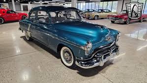 Image result for Regent Maroon 1952 Oldsmobile