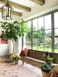 Place this gorgeous fireplace unit in the corner of your master bedroom or in the main living room for a cozy and comfortable environment. How To Decorate With Tall Indoor Plants