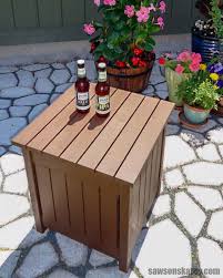 This step by step diy woodworking project is about outdoor side table plans.if you want to learn how to build a nice outdoor table, we recommend you to read the instructions with good judgement and to check out the diagrams, as well as the related projects. Diy Outdoor Side Table Impress Guests With Hidden Cooler Saws On Skates