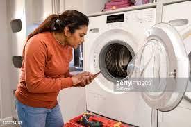 221 Washing Machine Repair Stock Photos, High-Res Pictures, and Images -  Getty Images
