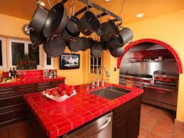 Adding a dash of color—a playful red chair or a joyous yellow accent wall—can kick up any kitchen. 8 Red Kitchens To Die For Tile Countertops Kitchen Tile Countertops Kitchen Colors