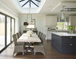 This contemporary kitchen features a. How To Design A Kitchen To Include A Dining Space Davonport