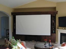Giant Projector Screen In Entertainment Center Elderly Home Home Buying Living Room Remodel