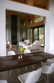 You will be hanging (literally) in style in the thick, saddle leather sling of this modern lounge chair. Seattle Jonathan Adler Rooms Contemporary Living Room B B Italia Sofas Blu Dot Toro Lounge Chair Chilewich Placemats Concrete Floor Contemporary