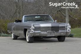 Image result for Starlight Silver 1965 Cadillac