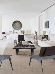 A coffee table is a low table designed to be placed in a sitting area for convenient support of beverages, remote controls, magazines, books (especially large, illustrated coffee table books), decorative objects, and other small items. Coffee Tables Nest