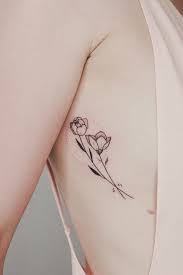Bite The Tattoo On Your Shoulder Meaning 23 Flower Tattoos Designs And Meanings For Your Inspo Meaningful Flower Tattoos Flower Tattoos Tattoos