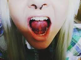 Septum Blonde Hair And Under Toungue Facial Piercings Web Piercing Body Piercings