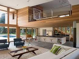 The rear wall of the house was opened up with continuous glass windows and doors to maximize the views and light. Interior House Design With 2nd Floor Novocom Top