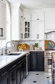 White and black kitchen cabinets already scream classic, but adding some dark wood into the picture takes it a step further. 25 Black White Kitchen Cabinet Ideas Sebring Design Build
