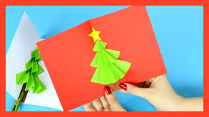 Instead of cutting slits in the construction paper, you will fold each of the pieces along the black dotted lines. Christmas Tree Pop Up Card Craft For Kids Youtube