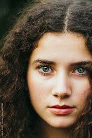 Ph Laura Stolfi For Stocksy United Extreme Close Up Of Beautiful Baby Faced Curly Woman Extreme Close Up Portrait Close Up Portraits