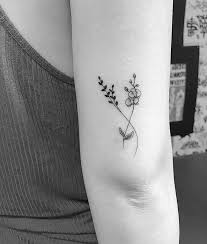 Yellow orchids symbolize friendship and new. 117 Of The Very Best Flower Tattoos Tattoo Insider Orchid Tattoo Flower Tattoos Tattoos