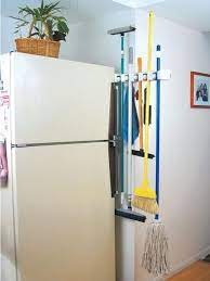 For a single step towards major closet organization, check out the popular and customizable rubbermaid configurations closet kit. Sliding Home Organizers For Mops And Brooms Space Saving Storage Solutions