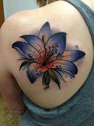 55 Awesome Lily Tattoo Designs Cuded Beautiful Flower Tattoos Lily Flower Tattoos Lily Tattoo Design