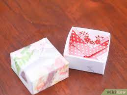 Follow the steps outlined in this tutorial to place a cute garland across your wooden box spelling out the word cards to let guests know just what the box is for. How To Make A Gift Box Out Of A Greeting Card With Pictures
