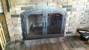 The uttermost rosen gold fireplace screen is a noble addition to your fireplace. Handmade Custom Hammered Iron Fireplace Doors Fireplace Screen Twisted Handle By Lazy K Metalworks Custommade Com