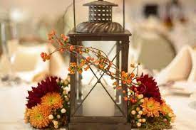 Fall Lantern Centerpiece With Bittersweet Wrap By Sebesta Design Fall Wedding Diy Flower Centerpieces Wedding Wedding Floral Centerpieces