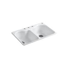 There are 4 faucet holes and a drain in each bowl. Kohler Hartland Tm Self Rimming Kitchen Sink With Four Hole Faucet Drilling The Home Depot Canada