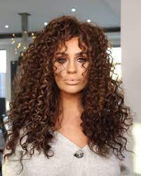 Curly bangs will make you showcase your curls even when you aren't confident about them. 19 Most Popular Ways To Get Curly Hair With Bangs Right Now