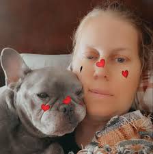 Boca Raton Pioneer Kate Rickard holding puppy 1910's. from Schmidt Boca  Raton Historical Society.