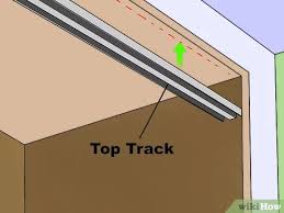 Some types slide into a space in the parallel wall in the direction of travel. How To Install Sliding Closet Doors 13 Steps With Pictures