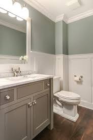 Is wallpaper in the bathroom a good idea? Tranquil Bathroom Features Upper Walls Painted Gray Green And Lower Walls Clad In Board And Batten Lin Tranquil Bathroom Small Bathroom Remodel Bathroom Design