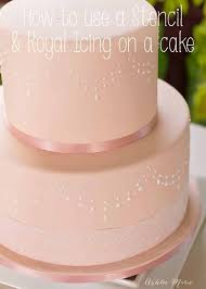 This frosting layer helps the fondant stick to the cake and smooths out any bumps or imperfections on the. How To Use Stencils To Perfecly Decorate A Fondant Cake With Royal Icing Ashlee Marie Real Fun With Real Food