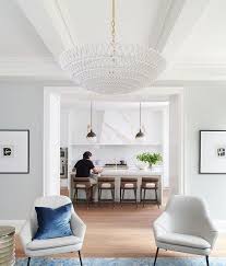 Une Nouvelle Construction Au Charme Sobre Et Feminin Coffered Ceiling Dining Room Cozy Dining Room Small