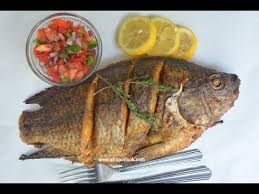 What temperature do you cook tilapia? 9 Fish Recipes How To Make Oven Grilled Tilapia Fish Afropotluck Youtube Grilled Tilapia Grilled Fish Recipes Whole Tilapia Recipes