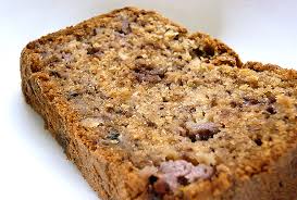 This recipe makes a delightful banana cake packed with chocolate chips for a delightful way to enjoy a classic flavor combination. Banana Chocolate Walnut Loaf Gourmet Traveller