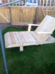 There's a wide variety of pallet plans here that including helping you make a cooler holder, patio bar, swing bed, outdoor furniture. Pallet Lounge Chair With Armrest Easy Pallet Ideas