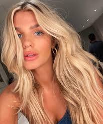 To keep your platinum blonde hair looking fabulous and bright use purple shampoo to neutralize yellow tones between salon visits. Sunny Girl Blonde Is The Bright Beautiful Shade We Re Obsessing Over For Summer Glamour