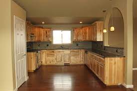 Kitchen knotty hickory recessed panel wide rails raised neck glass doors staggered heights full overlay homepage shaker style dark color #5 triple step kitchen rustic style knotty hickory perimeter with medium color black painted island with sand through raised bar with posts columns legs open. Knotty Hickory Cabinets Houzz