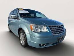 Image result for Light Ice Blue 2008 Town Car