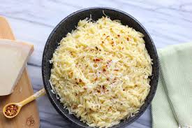 When the oil begins to bubble around the garlic, add the cooked orzo pasta, tomatoes, basil, and parmesan cheese. Easy Parmesan Orzo Pasta I Heart Vegetables