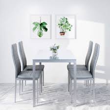 5d x 30h the ace dining table features a smooth gliding mechanism that extends each end of the table rectangular design is made to seat up to 6 people sleek gray tempered glass top design is unique and visually appealing features contemporary cross leg base design the table is topped with tempered glass. Beliwin Glass Dining Table And 4 Chairs Gray Modern Kitchen Dining Room Set Rectangular Glass Tabletop And High Back Chairs Grey Buy Online In Armenia At Armenia Desertcart Com Productid 214971325