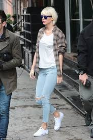 Taylor swift performs in china as victoria's secret mdoels assemble. Taylor Swift Wears Grungy Flannel Before Slipping Into A Nearly Matching Patterned Dress As She Goes Clubbing In Nyc Daily Mail Online