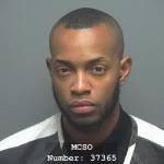 RACCA, DANIEL TRAVIS