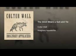 Saw him driving down the 61' in early july white as a cotton field and sharp as a knife i heard him howling as he passed me by. Playlists Containing The Song Colter Wall The Devil Wears A Suit And Tie Discover New Playlists And New Songs Playmoss Playlists