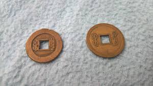 Bronze chinese coin with square hole. Why Did Former Chinese Coins Have A Squared Hole In The Center Was It Just For The Purpose Of Making It Harder To Produce And Counterfeit Them Or Did It Serve Another