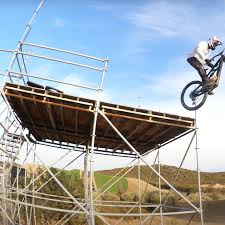 Pro Freeride Mountian Biker and Olympic Motocross Rider Shred the Slayground  - BikeMag