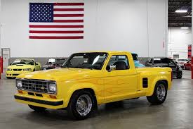 Image result for Bright Yellow 1990 Truck