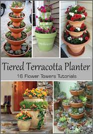 Make a tiered arrangement with the other, smaller pots, and plant them with white petunias and white pelargoniums. 16 Tiered Terracotta Planter Tutorials Clay Pot Crafts Flower Pots Outdoor Clay Pot Projects Stacked Flower Pots