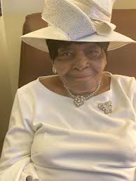 My husband, Rev William Lanier Pullam, (age 73) sitting in his Pastor's  Church office. His Mother, Mrs. Arlena Pullam stands at his side. She's 93  years old, born in the 1920's, have