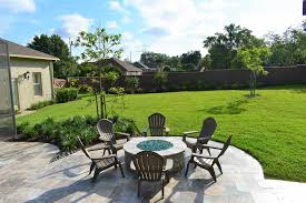 Screen room sandstone screen room with knee wall enclosing existing covered patio. Central Florida Backyard Rooms The Landscape Renovator